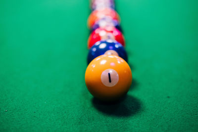 Close-up of multi colored ball on table