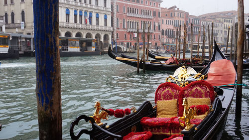 View of boats moored in canal