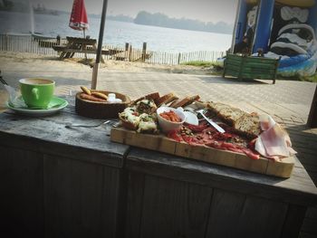 Close-up of food on table at sea shore