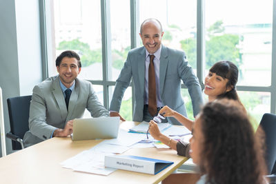 Business colleagues working in office