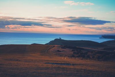 Scenic view of sea against sky during sunset