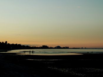 Scenic view of sea at sunset