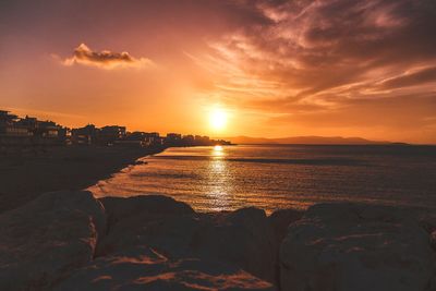 Scenic view of sea against sky during sunset