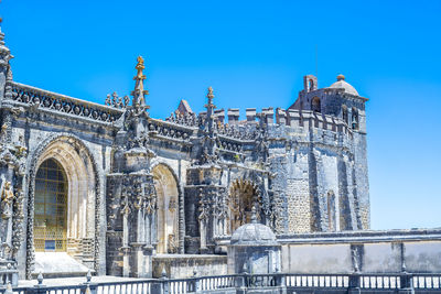 Low angle view of cathedral against blue sky