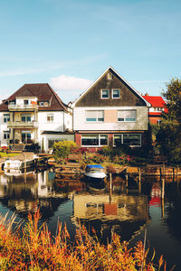 Beautiful view of sailboats and houses at steinhudermeer, lower saxony, germany