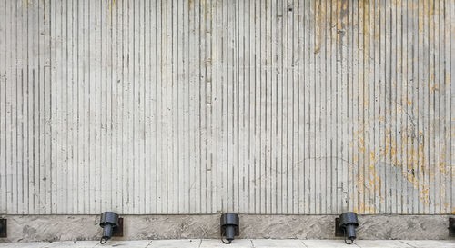 Low section of man on tiled floor