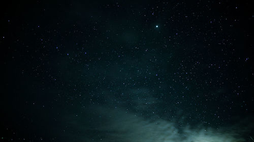 Low angle view of stars against sky at night