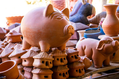 Close-up of pottery at market stall