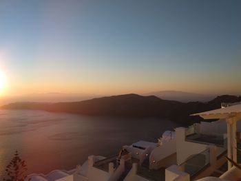 Scenic view of sea against clear sky during sunset