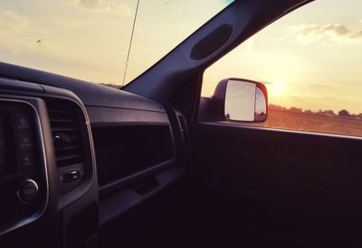 Close-up of car against sky