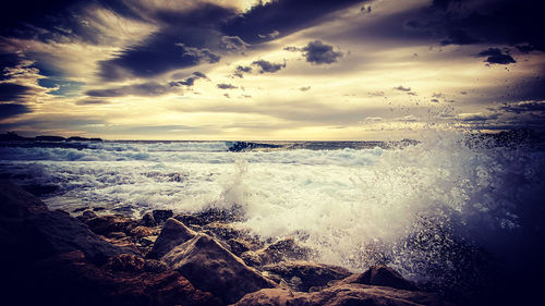 Scenic view of sea against sky during sunset