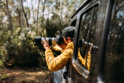 Man photographing with camera