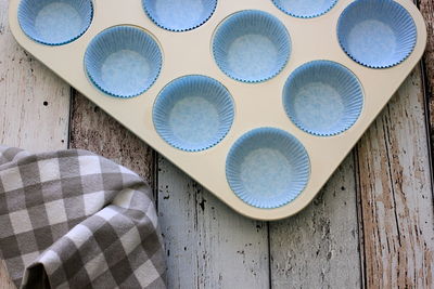 Close-up of empty cupcake holder on table