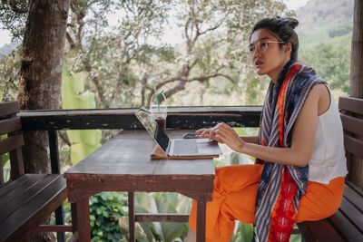 Young woman using mobile phone