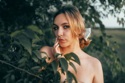 Portrait of young woman looking away