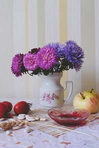 Flowers in vase on table