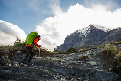 Female hiker on the way up to torres del paine national park patagonia