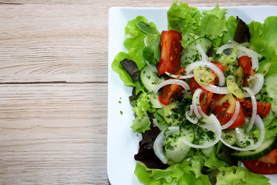 High angle view of chopped vegetables on table