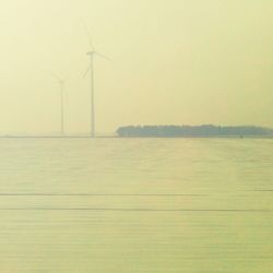 Power lines against sky