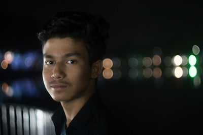 Portrait of woman at night