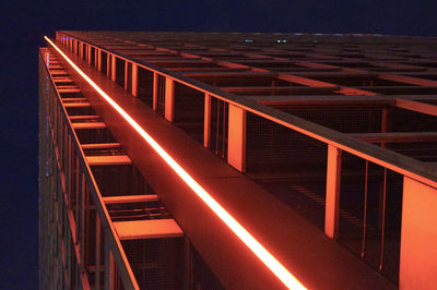 Low angle view of illuminated building at night