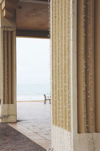 Scenic view of sea against sky seen through window