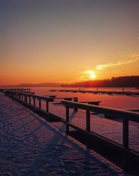 Scenic view of sea against clear sky during sunset