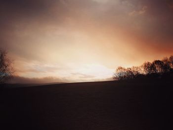 Scenic view of silhouette landscape against sky during sunset