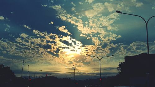 Road against sky at sunset