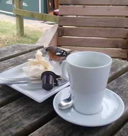 Close-up of coffee cup on table