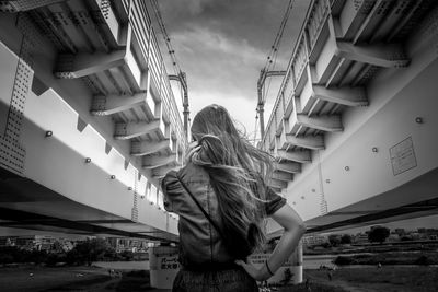 Woman standing in front of building
