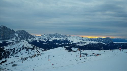 Scenic view of mountains against sky during winter