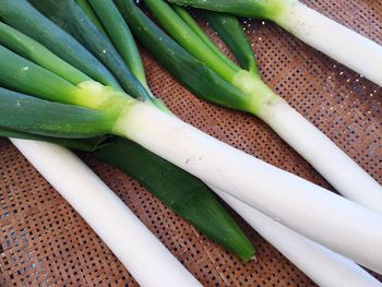 Close-up of spring onions on seat