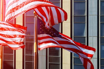 Low angle view of flag against the sky