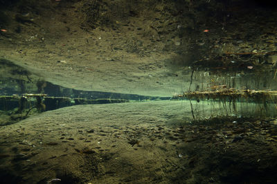 Scenic view of lake against sky at night