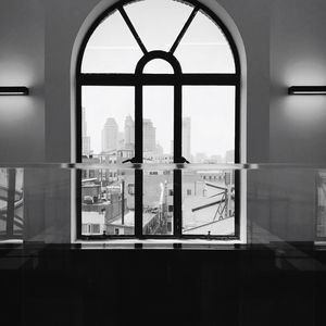 View of buildings through window