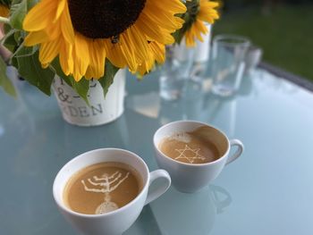 High angle view of coffee served on table