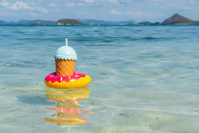 View of cupcakes on sea shore