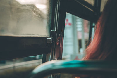 Man seen through train window
