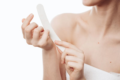 Midsection of woman holding hands