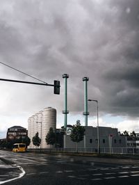 City street against cloudy sky