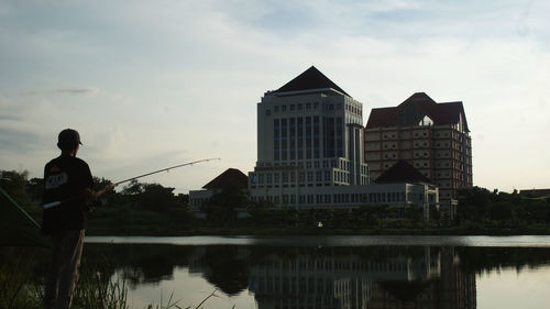 Reflection of buildings in lake