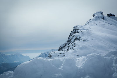 Scenic view of snowcapped mountain against sky