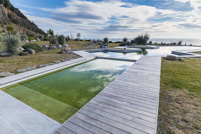 View of swimming pool against sky