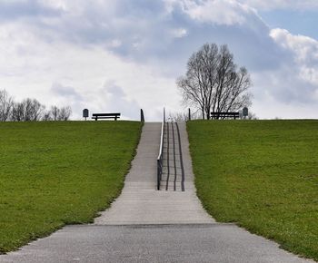 Footpath on grassy field