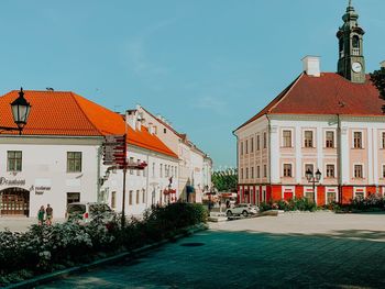 Buildings in city against sky