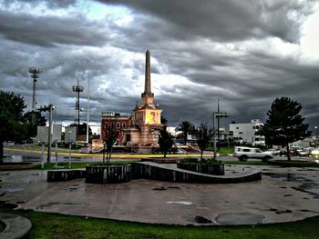 View of mosque against cloudy sky