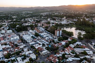 High angle view of townscape against sky during sunset