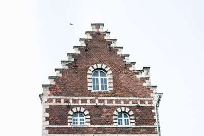 Low angle view of built structure against clear sky