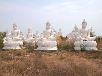 Statue of temple against sky